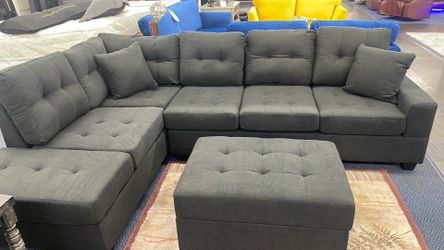 Reversible Sectional With Drop Cup Holder And Storage Ottoman