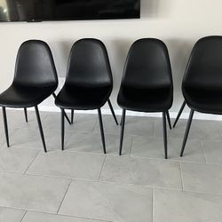 4 Black Leather Dining/ Kitchen Chairs With Metal Legs Used Yo Stage A House