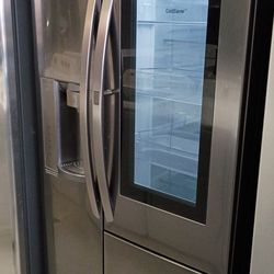 Grey LG side/side refrigerator with warranty delivery available fee depends on address 🏠🚛🛣️