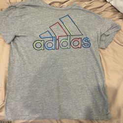 Grey Adidas Shirt With Different Colored Logo For Boys 