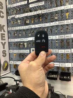 Dodge/Chrysler/Smart Proximity Remote/Charger/Challenger/Dart/Chrysler 300 Proximity Smart Duplicate Copy INCLUDES PROGRAMMING