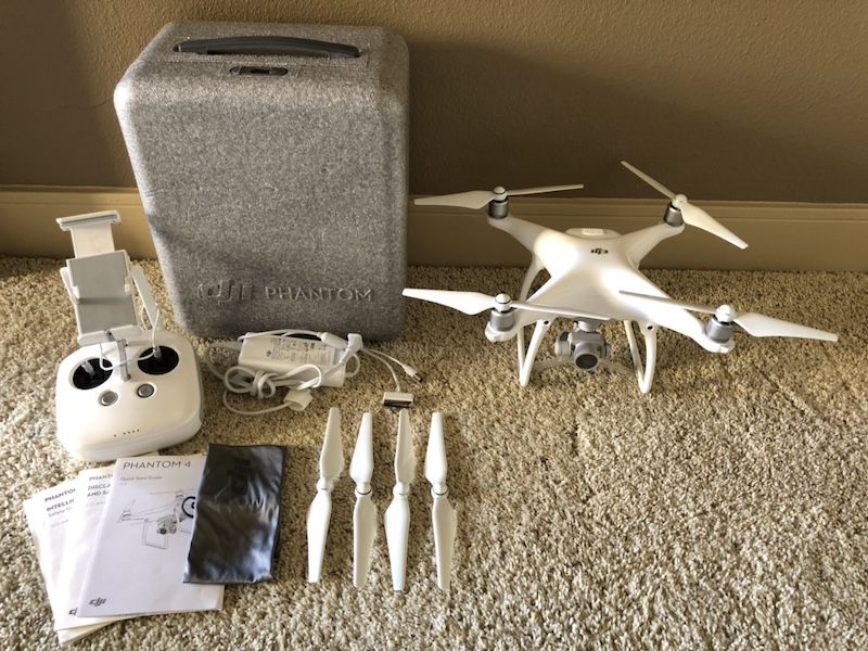 DJI Phantom 4 Drone and Accessories - Mint Condition