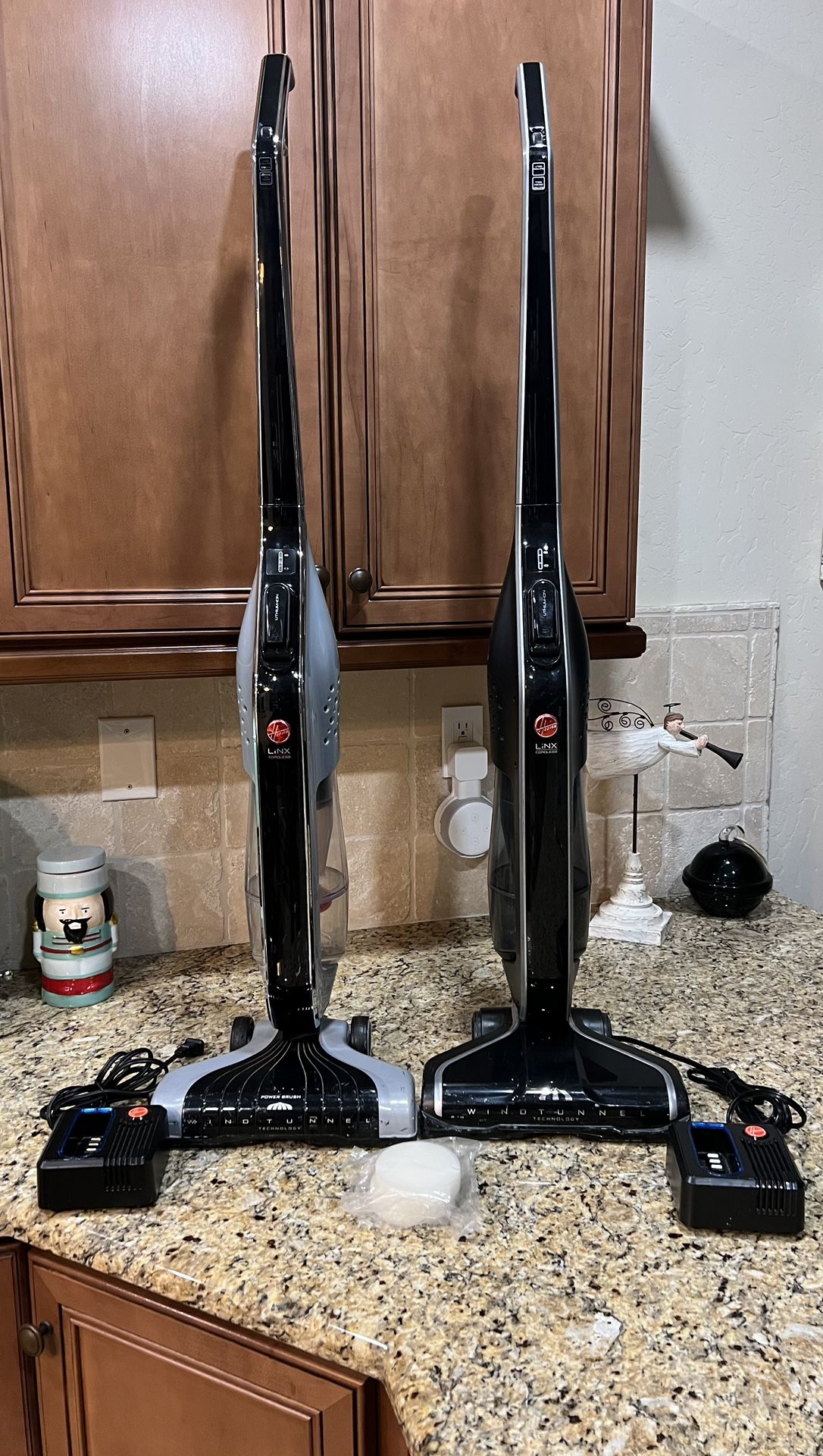Two Hoover Cordless Vacuum Cleaners.