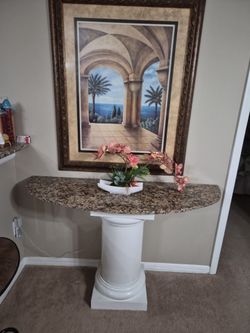 Mesa e granito y cuadro (Granite table with picture)