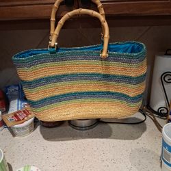 St John's Bay straw tote bag with bamboo handles and teal lining