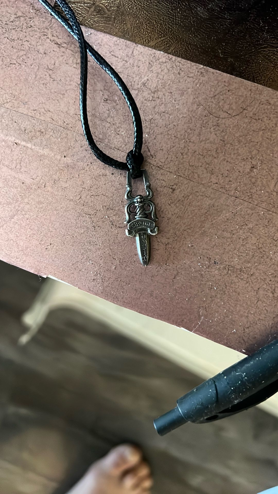 Silver chrome heart dagger pendant