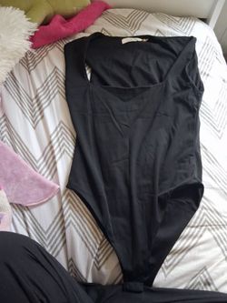 Black bodysuit shape where