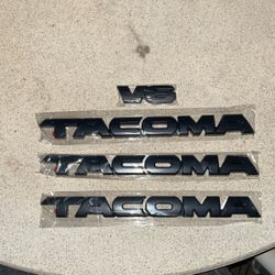 2005-15 Toyota Tacoma Black Overlay Emblem 