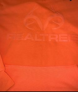 Realtree Men's Performance Fleece Pullover Hoodie in Blaze Orange/Hunter Orange, featuring a prominent embossed text and antler logo on the chest.