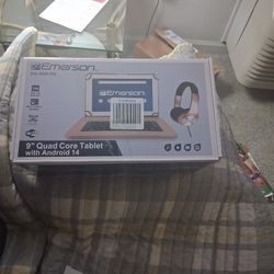 Nine inch quad core tablet with android fourteen includes headphones