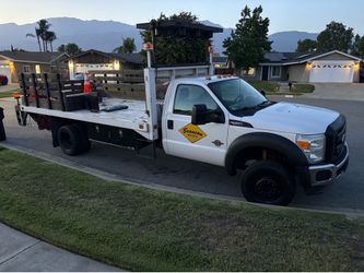 2012 Ford F550 Diesel Stake flat bed arrow board lift gate