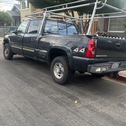 2002 Chevy Silverado Four-Wheel-Drive 209,000 Miles On It. Rebuilt Transmission Very Well Taken Care Of Maintenance Paperwork Clean Title.
