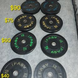 Olympic Bumper Plates And Metal Standard 45s