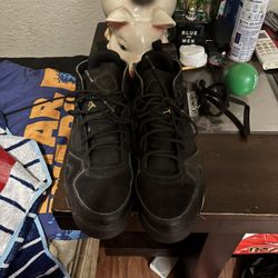 Jordan Flight Club 91 'Black Metallic Gold' sneakers. 