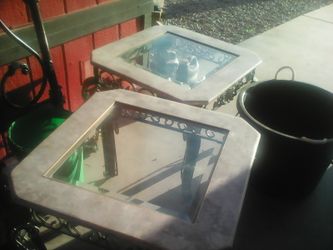 Heavy end tables with glass tops