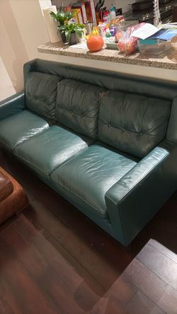 Green leather comfortable couch
