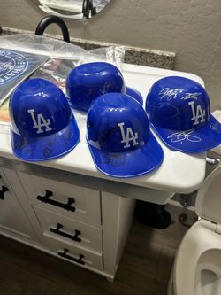 Dodgers sign helmets