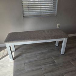 White Wood Bench with Gray Upholstered Seat