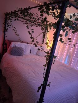 Black metal canopy bed frame
