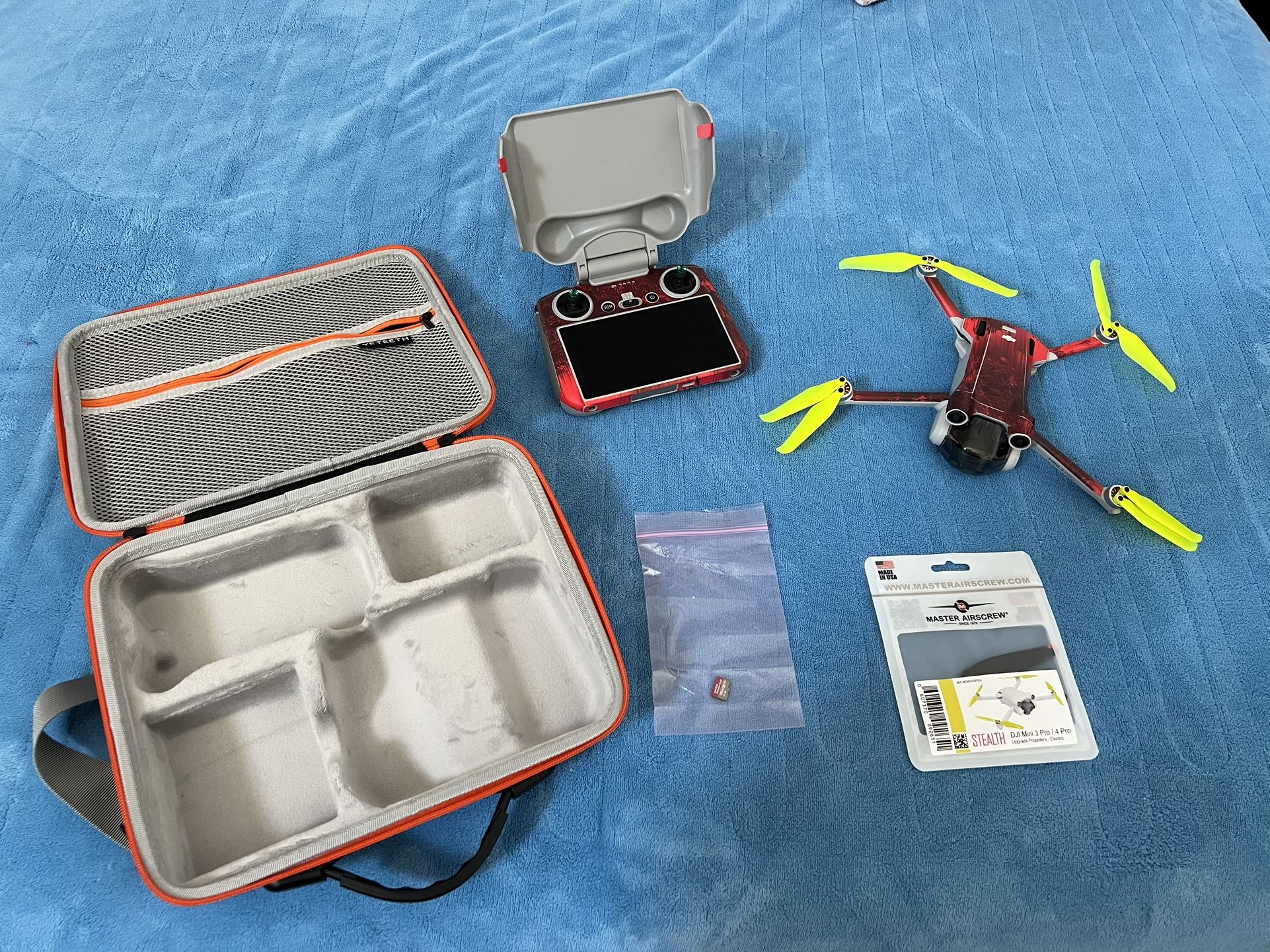 Dji Mini 3 Pro (New ) W/Controller, Flip Cover, Battery, MAS Props, Skin, 128gb SD And Carrying Case