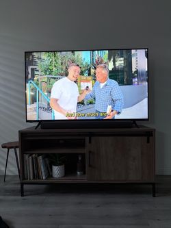 Smart TV w/ Soundbar and Entertainment Center