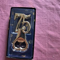 BOTTLE  OPENER  WITH A NEMBER  75  ORIGINAL PRICE $75. 