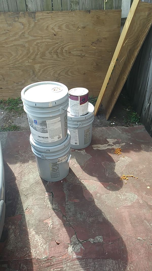 10 GALLONS OF FINE LIGHT TAN EXTERIOR PAINT AND 1 5 GALLON