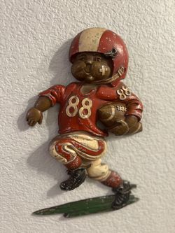 Vintage HOMCO Cast Metal Football Player Wall Decor stamped 1254 and HOMCO USA 1976.