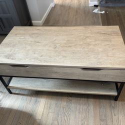 Lift top coffee table with storage
