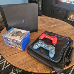 PS4 Pro Bundle with 2 Controllers and 9 Games