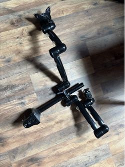 Dual Monitor Arm / Desk Mount – Adjustable  Adjustable dual monitor mount in good condition. Fits most monitors with VESA mounting. Great for saving d