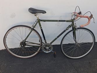 1970s Raleigh Grand Prix 10-speed road bike in a classic bronze green finish