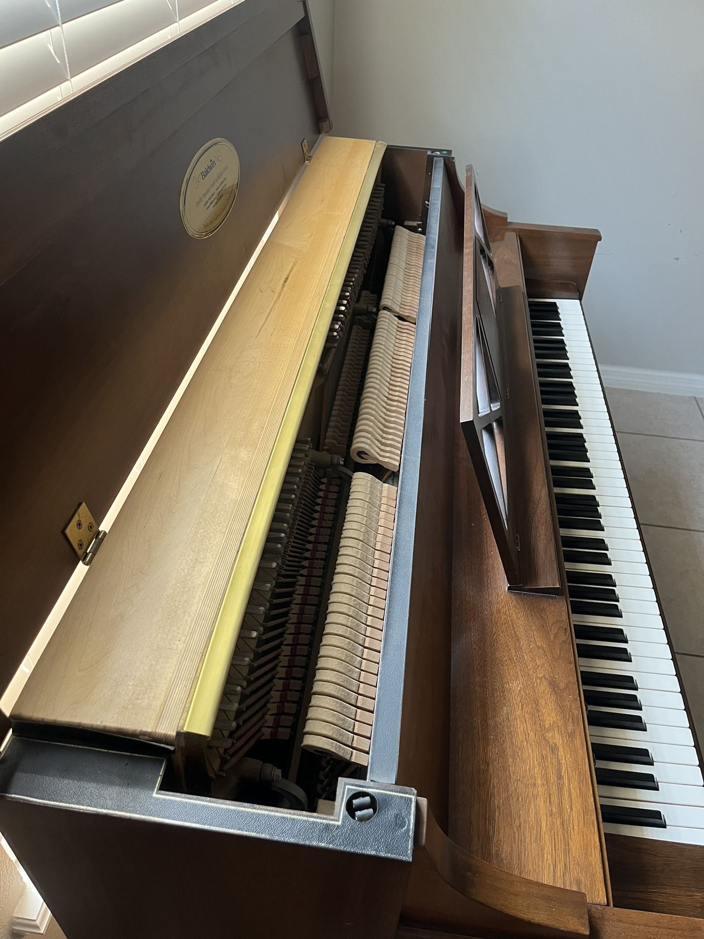 Baldwin console piano tuned built in dehumidifier