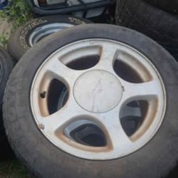 4 Uniroyal Tiger Paw on 1(contact info removed) Ford Mustang alloy wheels