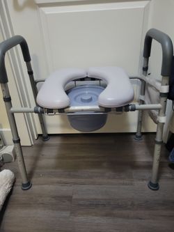 Raised toilet seat