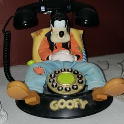 RETRO GOOFY PHONE, LANDLINE. HIS EYES OPEN AND HE TALKS WHEN PHONE RINGS YOU CAN GOOGLE AND SEE VIDEO