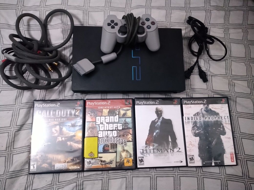 PlayStation 2 S-Video + 4 Game Bundle