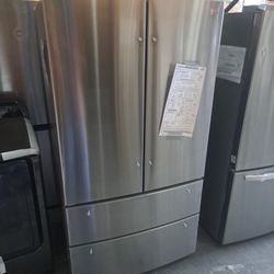 LG Four Door Refrigerator With Water Dispenser