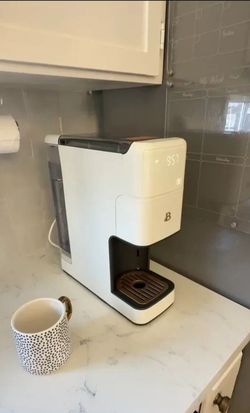 Coffee maker and coffee bean grinder