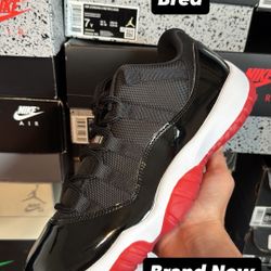 Jordan 11 Low Bred