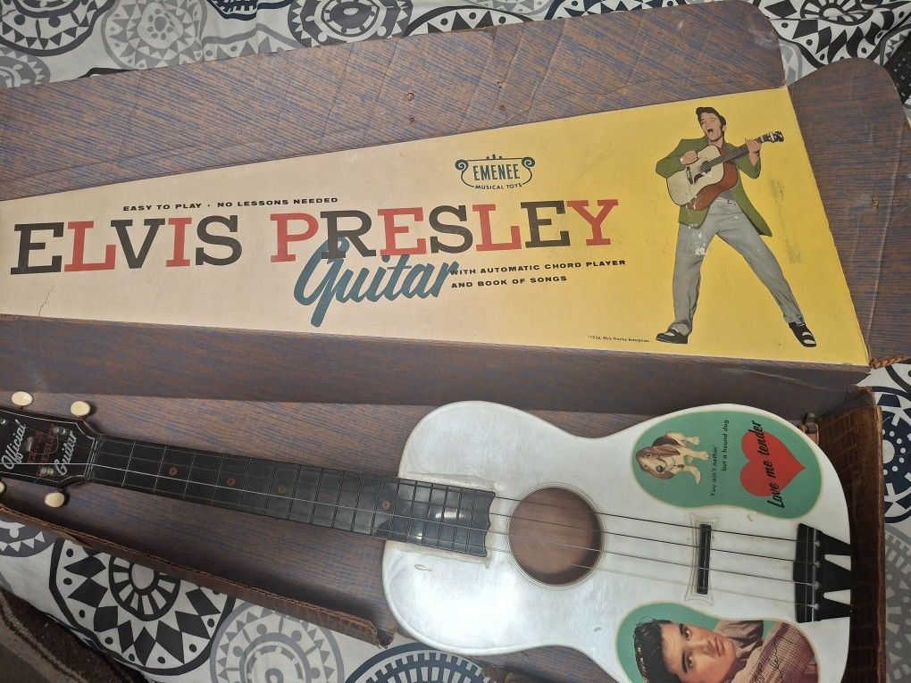 1956 RARE ELVIS PRESLEY TOY GUITAR VALUED AT OVER $1000
