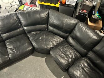 Nice black leather sectional couch