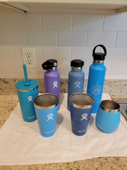 6 Hydroflasks and 1 Yeti metal cup