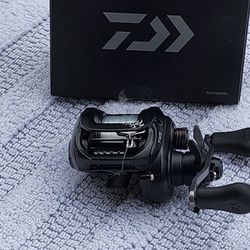 Brand new Daiwa Tatula 200 HSL lefthanded baitcaster with fresh line. $140 or trade for spin rod.