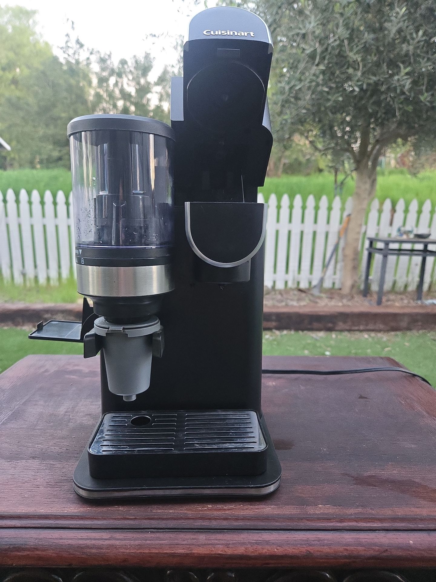 The Cuisinart Grind & Brew Single-Serve (DGB-2) is a versatile 3-in-1 coffee maker featuring a built-in conical burr grinder, a 48-oz reservoir, and c