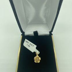 14KT YELLOW GOLD FLOWER CHARM 1.3GR 0.1CT