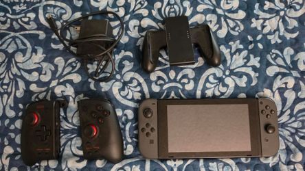 Nintendo Switch with Gray Joy-Cons and games