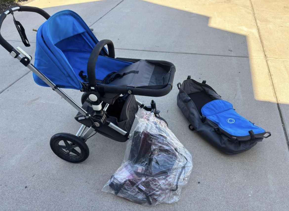 NEED TO SELL ASAP bugaboo cameleon stroller, complete with rainguard and bassinet!