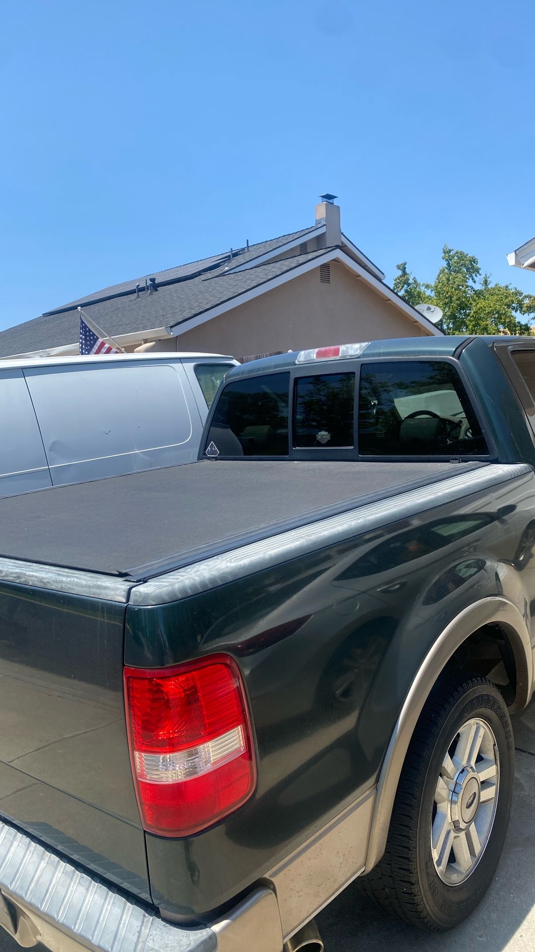 Revolver, truck bed cover new in the box.