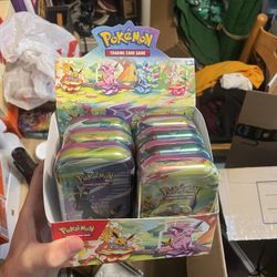 Prismatic Evolutions Mini Tins